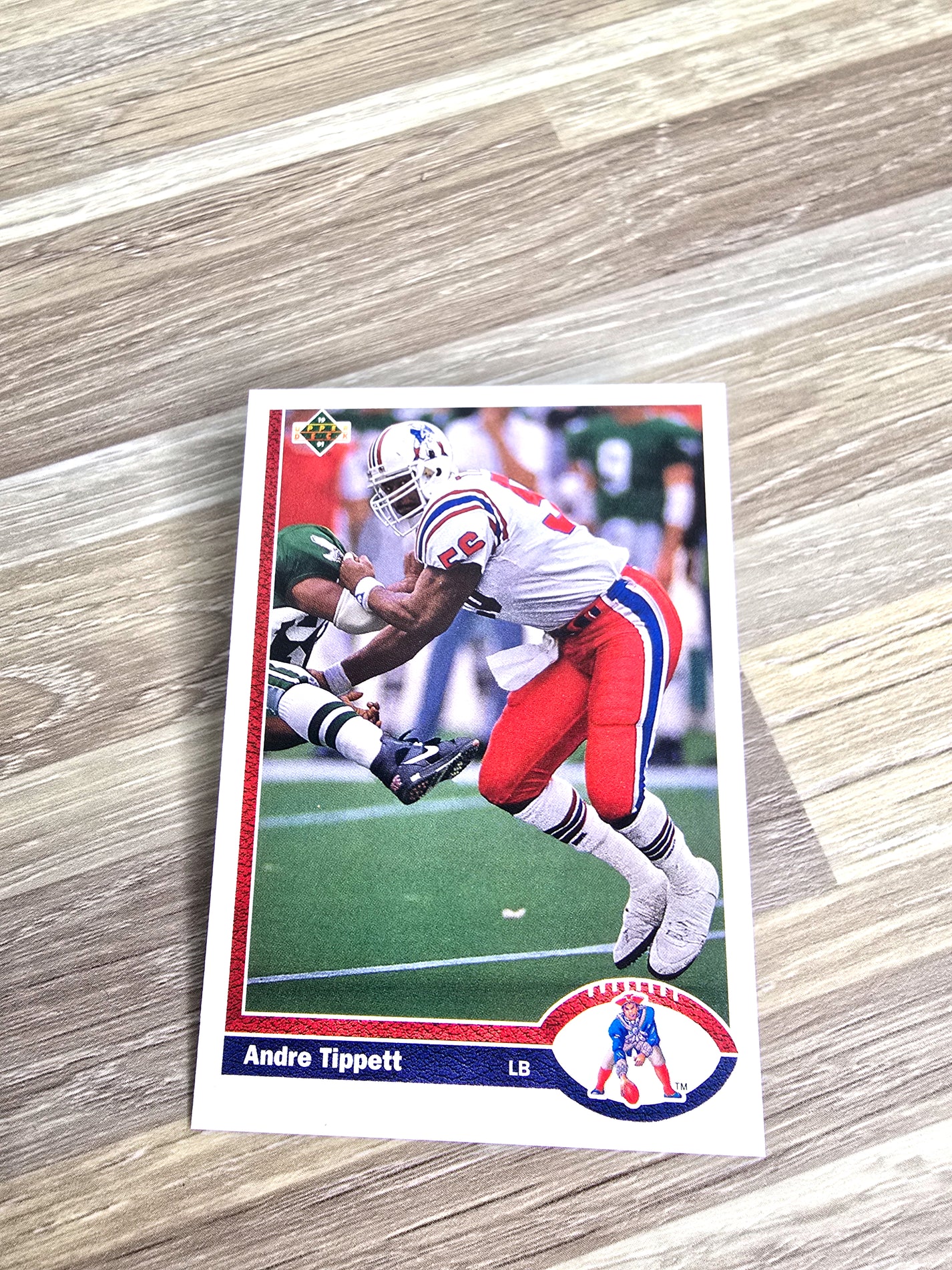 Andre Tippett NFL Football Card 1991 Upper Deck No. 354